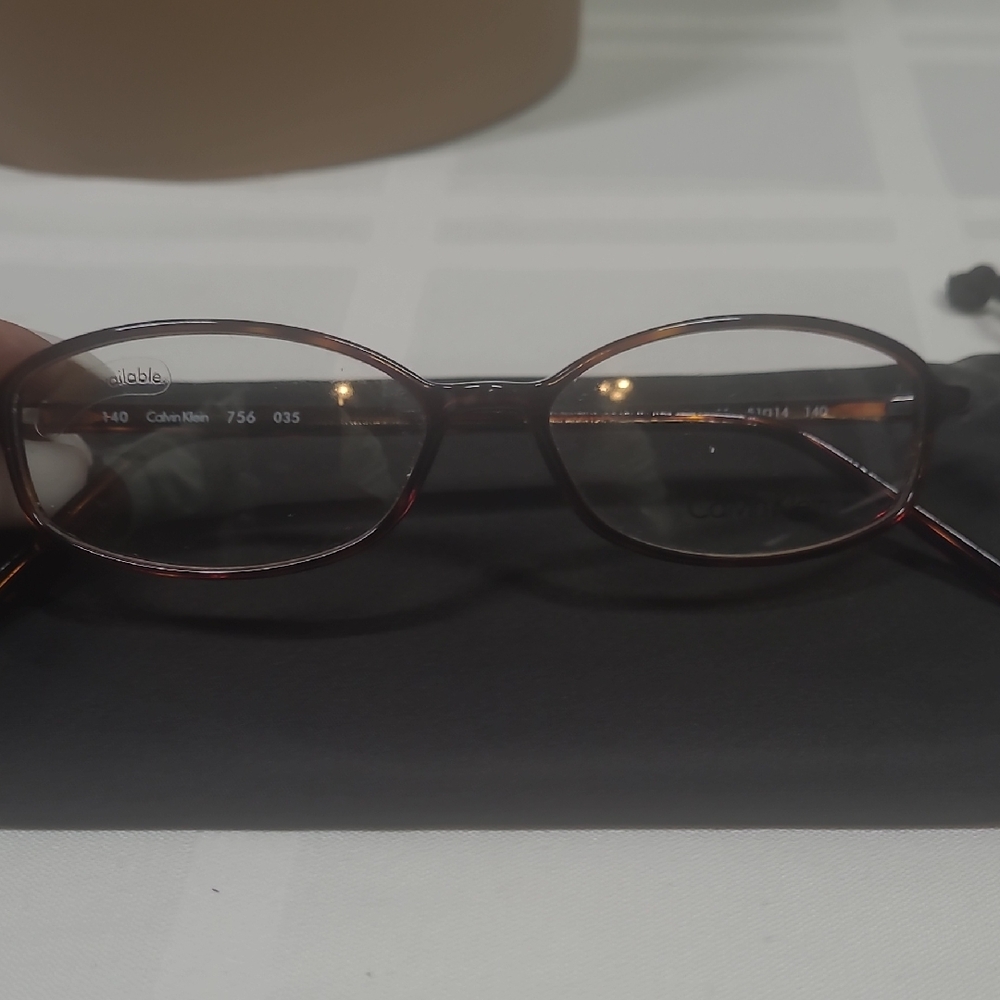 Calvin Klein Women's Elegant Dark Brown Glasses
